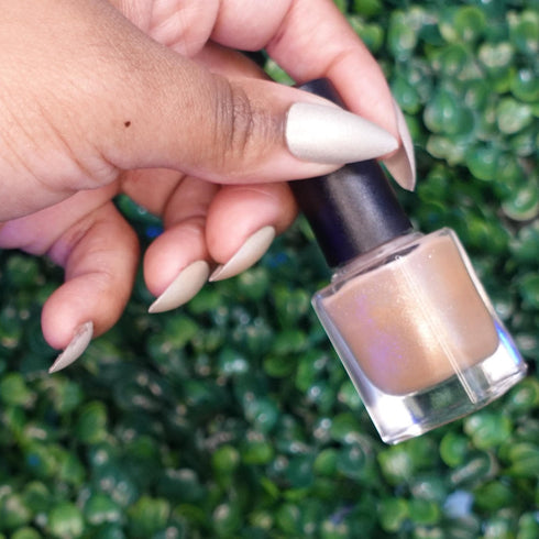 Nimbus Dragon ball z inspired photochromic silver to orange nail polish