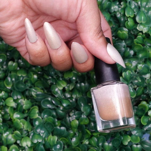 Nimbus Dragon ball z inspired photochromic silver to orange nail polish